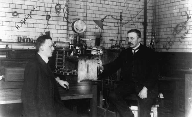 Black and white photograph of Ernest Rutherford and Hans Geiger.