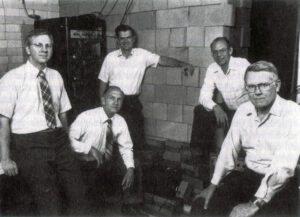 Professor Steven Jones and fellow BYU physicists with their neutron detection equipment. From left are Jones, J. Bart Czirr, Gary L. Jensen, Daniel L. Decker, and E. Paul Palmer.