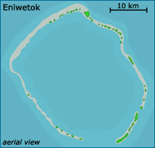 Top down view of atoll Eniwetok. Shows ring land with water surrounding and in the center.